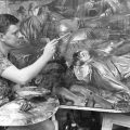 "Bruce Fletcher ... in the attic-like studio ... in Howard St., Glen Iris" Herald & Weekly Times Limited portrait collection. This work is in copyright. H38849/5350.