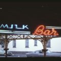 Exterior view of milkbars in North Carlton, Victoria, 1983/1984. Photo by Christopher van der Craats. This work is in copyright; H2019.250/28